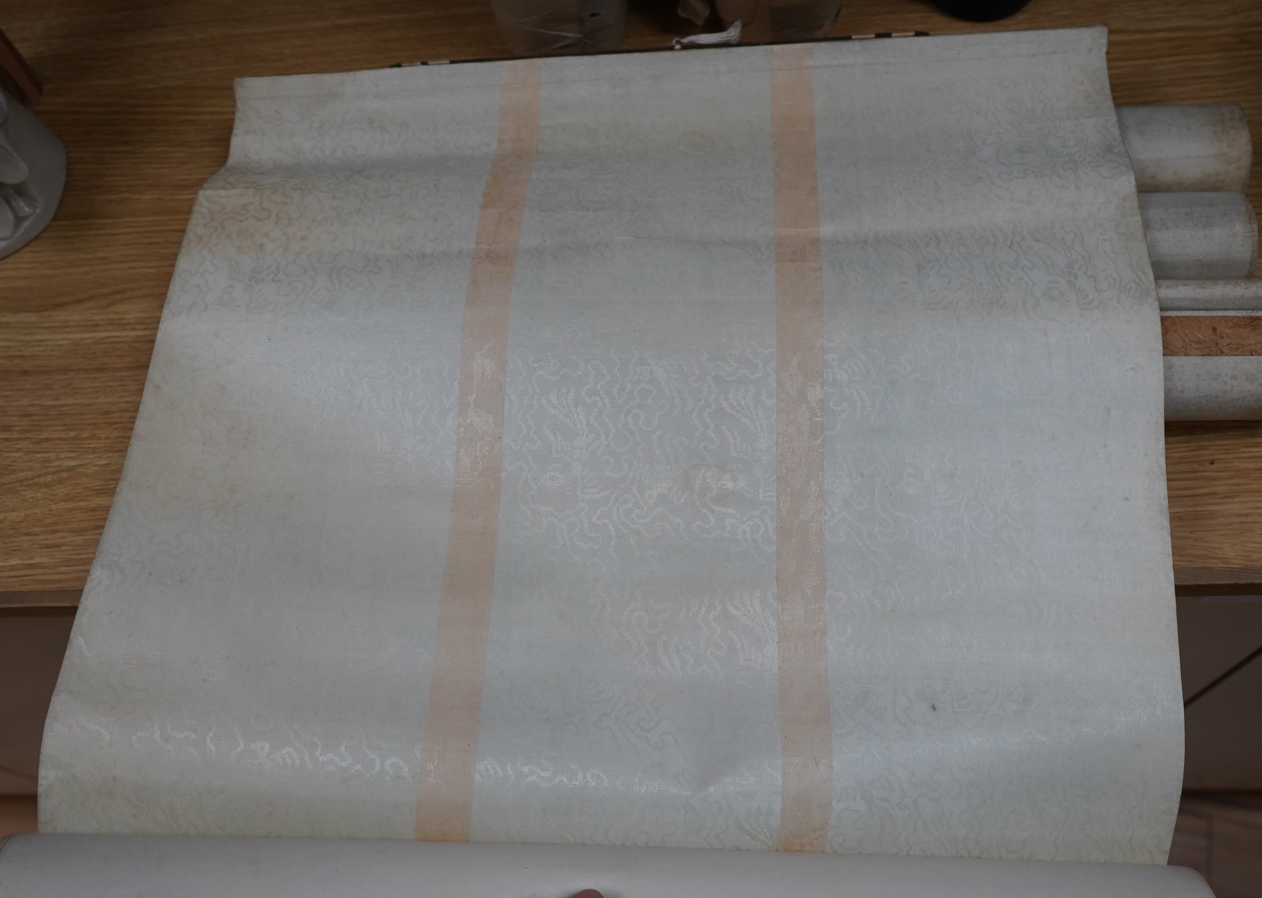 A set of four Chinese scroll paintings of ladies before landscapes, 48cm wide. Condition - fair